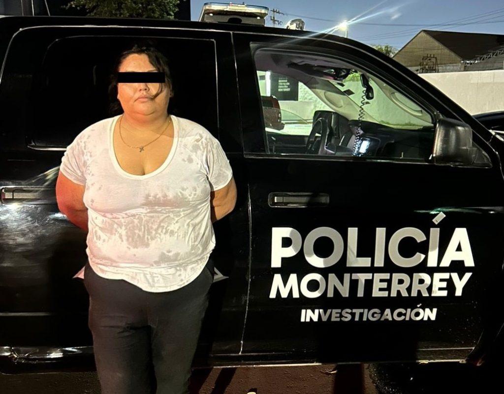 Arrested Woman Standing with Hands Behind Her Back Beside a Black Policía Monterrey Investigación Patrol Suv. - Nuevo León Primero