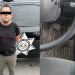 Man with a Black Bar over His Eyes Stands with Hands Behind His Back Beside a Black Police Vehicle Marked Monterrey Sspc. for Context: Informative Image of a Person Near a Police Car. - Nuevo León Primero
