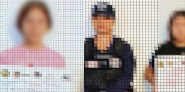 Four People Standing in a Row, Each Holding a White Sign with Text; Faces Blurred. - Nuevo León Primero