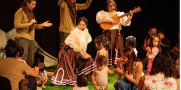 Group of Performers on a Stage with Children Dancing; a Woman Plays a Guitar As Others Guide the Kids. - Nuevo León Primero
